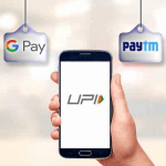 phone showing UPI and banner showing BHIM, Paytm, GPay and PhonePe