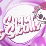 A skull with a crown of roses next to the words "Sugar & Skulls" against a sugary background.