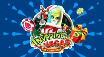 An alien Santa comes armed over a sign reading "Invading Vegas Las Christmas."