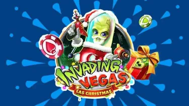 An alien Santa comes armed over a sign reading "Invading Vegas Las Christmas."